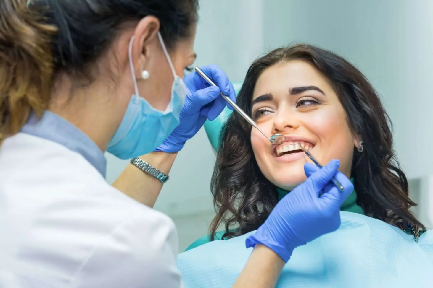 Dentist treating a patient at East Bay Family Dentistry in Oakland, CA